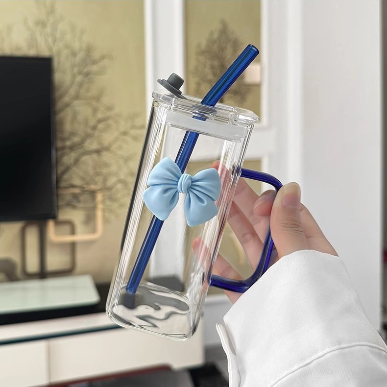 Blue transparent straw with bow, glass cover