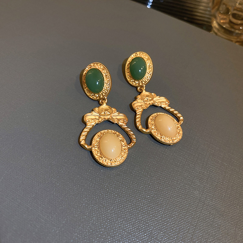 Silver needle elliptical earrings