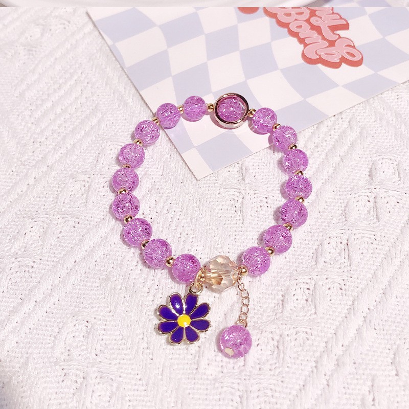 Pulsera de margaritas de color morado oscuro