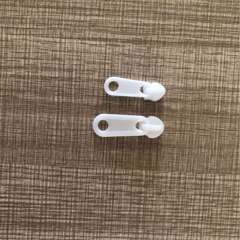 Factory thickened plastic pull Head No. 3 No. 5 black and white color ring guaranteed inspection zipper head with nylon zipper