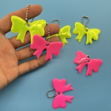 跨境PVC反光蝴蝶结挂件 定制logo吊坠挂饰钥匙扣箱包饰品夜间警示