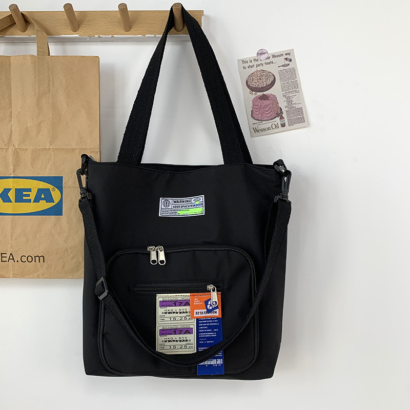 Nueva crossbody bolsa de lona de las mujeres de hombro de gran capacidad portátil estudiante moda nylon bolsa de lona bolsa de viaje bolsa