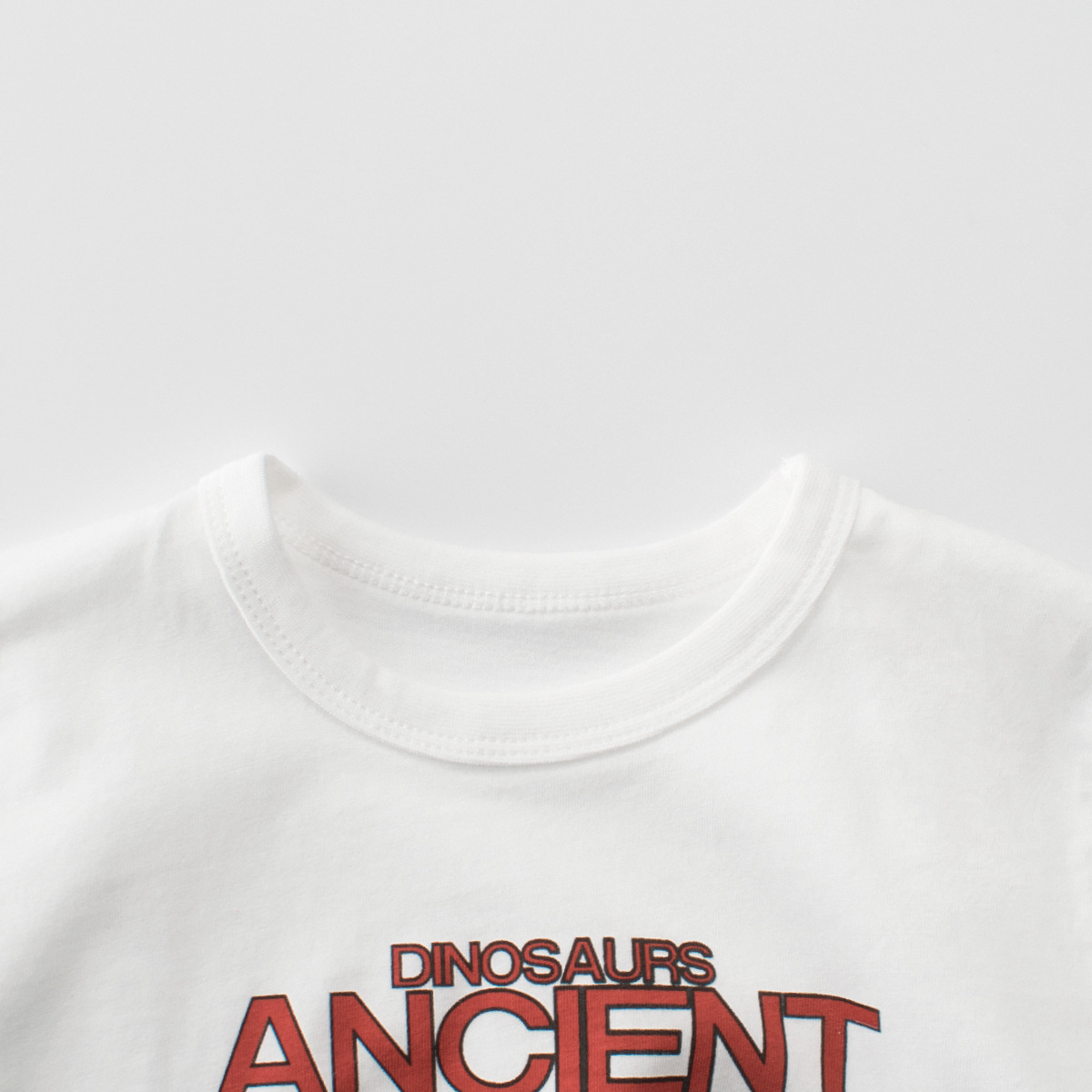 27KIDS ropa para niños Camiseta de manga corta para niños coreanos Ropa de bebé para hombres Impresión de dinosaurios Verano Nuevos productos