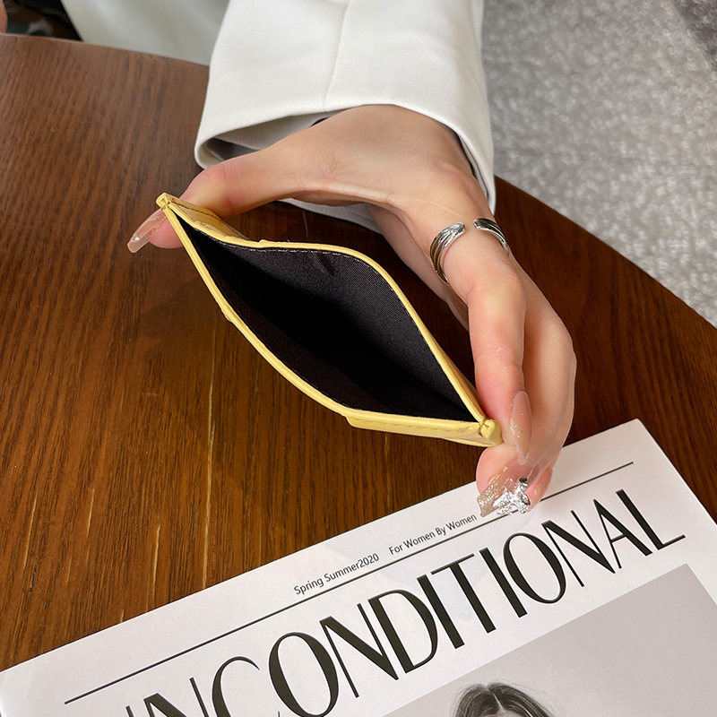 羊皮カードの薄いタイプの多カードの位置の小さい小銭入れの女性のシンプルなカードはカードを挟んで対外貿易のメーカーの直接販売の卸売りを包みます。