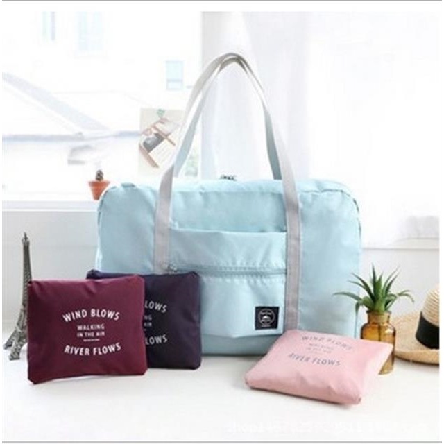 Estilo coreano fresco bolsa de viaje plegable bolsa de almacenamiento de viaje bolsa de jacquard bolsa de organización de ropa