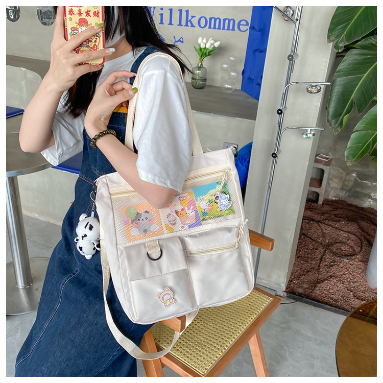 Large-capacity Japanese-style single-shoulder canvas bag for girls, versatile crossbody, ins, a tote bag for junior high school students' classes, and a schoolbag for after-school tutoring undefined