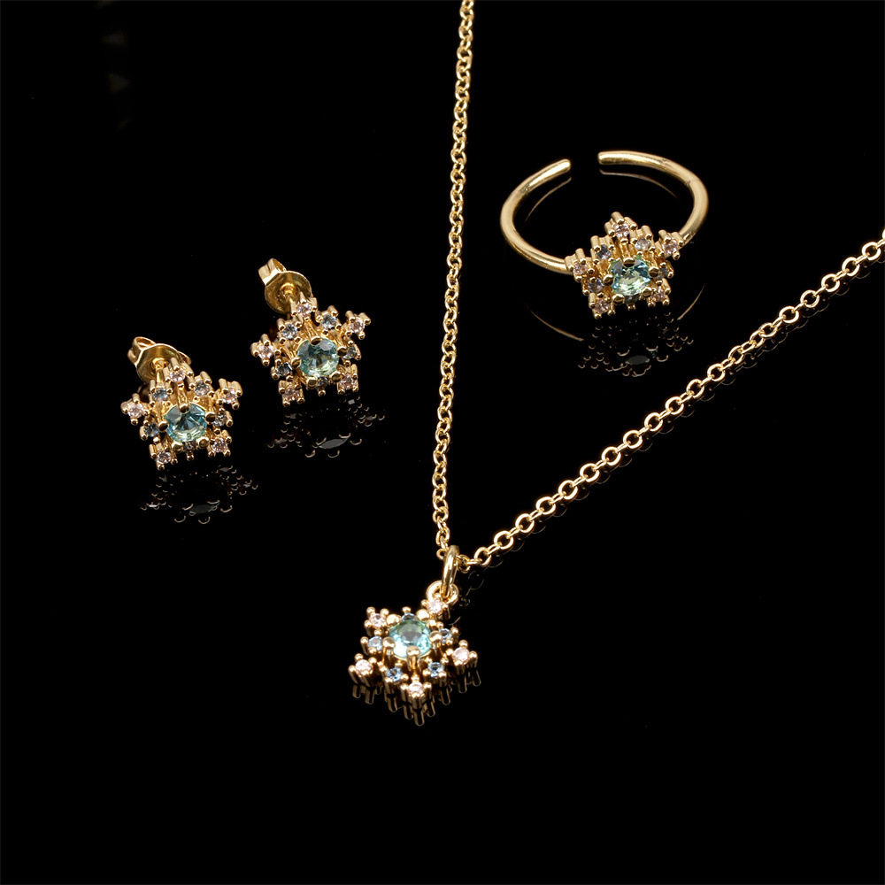 2021 New Inlaid Zircon Snowflake Copper Pendant Three-piece Necklace Earrings Ring Tide Temperament Jewelry Set display picture 12