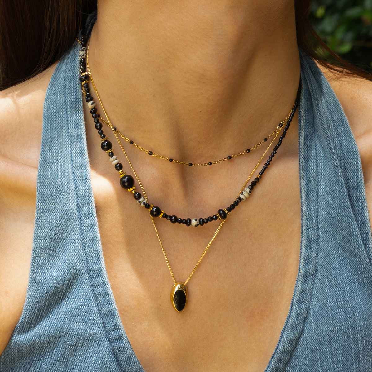 Collar de acero inoxidable TENA Europa y América lujo ligero nicho universal piedra natural collar de acero titanio mujer cruzada venta caliente cadena clavícula