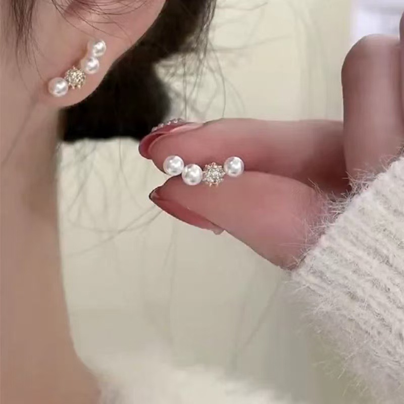 Aguja de plata, perla, circón, borla, pendientes de moda, lujo ligero, pendientes de alta gama, pendientes de todo fósforo exquisitos de nicho, mujeres al por mayor