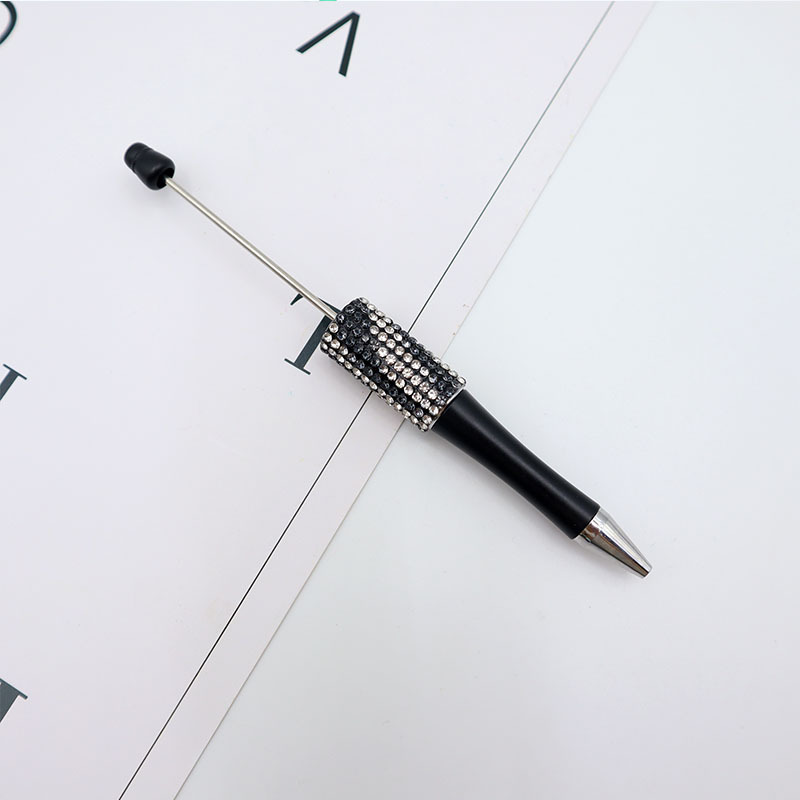 Bolígrafo giratorio de grano lindo de color degradado de tendencia de alto valor Bolígrafo de gomas galvanizado con cuentas de diamantes de bricolaje creativo