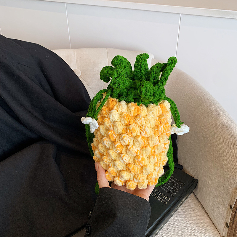 Caricatura lindo piña estilo de niños y niñas bolsas de cubo de agua gancho de aire extranjero fruta mochila nuevo mini bolso para niños