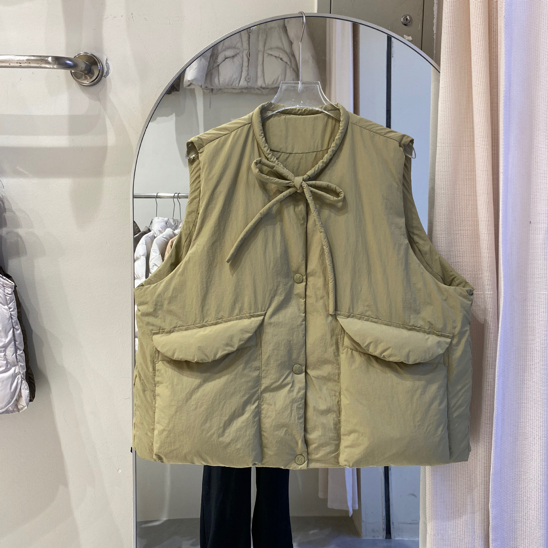 New Korean-style oversized, loose-fitting, slimming, versatile sleeveless down vest for women, suitable for commuting and featuring a traditional Chinese aesthetic