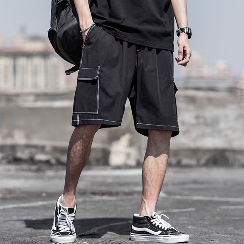 Pantalones cortos estadounidenses de cinco puntos de marca de moda para hombres de verano al por mayor pantalones finos de seda de hielo deportivos sueltos de gran tamaño súper transpirables