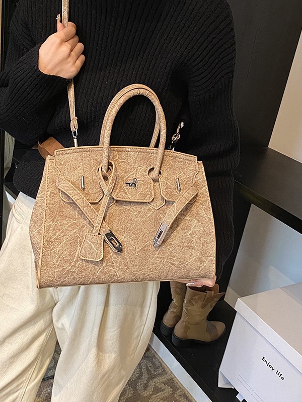 Bolso de platino simple retro ventas calientes de mujeres nuevas moda transfronterizas de alta calidad Kelly bolso de hombro de gran capacidad