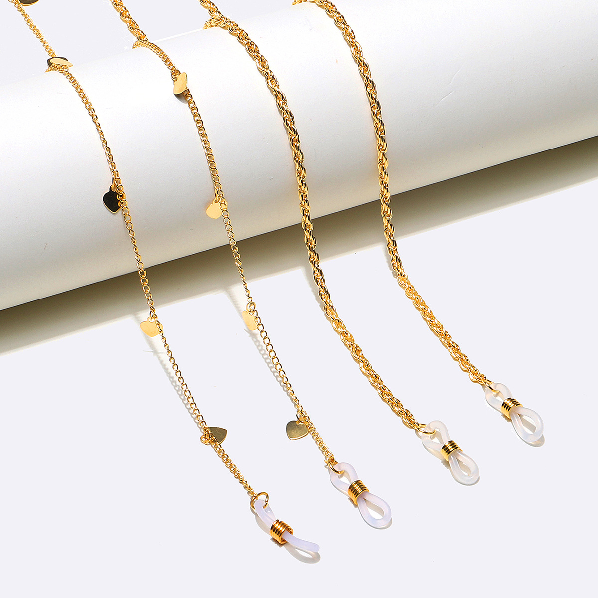 Einfache Mode Zweiteilige Kupfer Twist Herz Gold Brille Kette Großhandel Nihaojewelry display picture 1