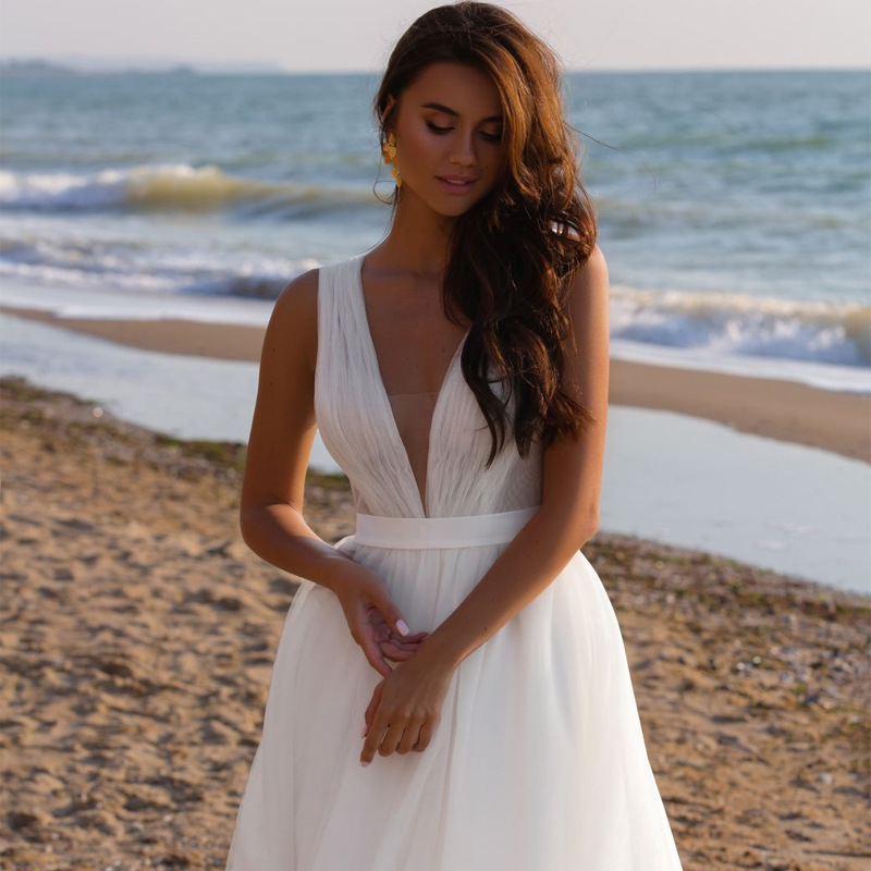 Blanco sin mangas playa de viaje de novia ligera vestido de novia al aire libre Qidi comercio exterior vestido de fotografía sexy image 6