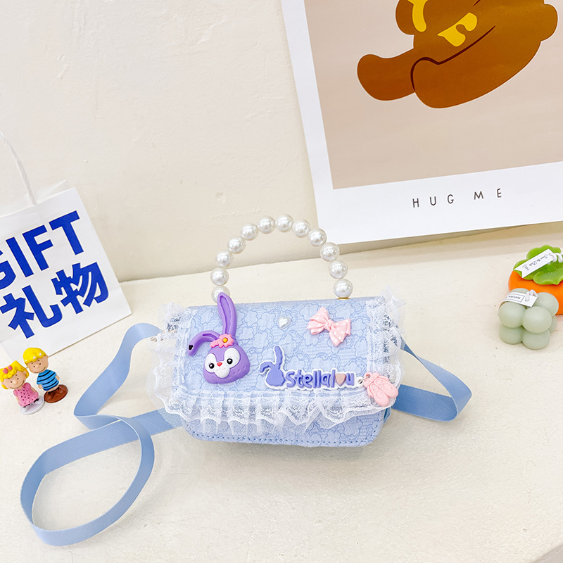 Bolso de los niños al por mayor bolsa de mensajero de las niñas bolso de perlas de moda de dibujos animados accesorios bolsa estrella Delu mochila