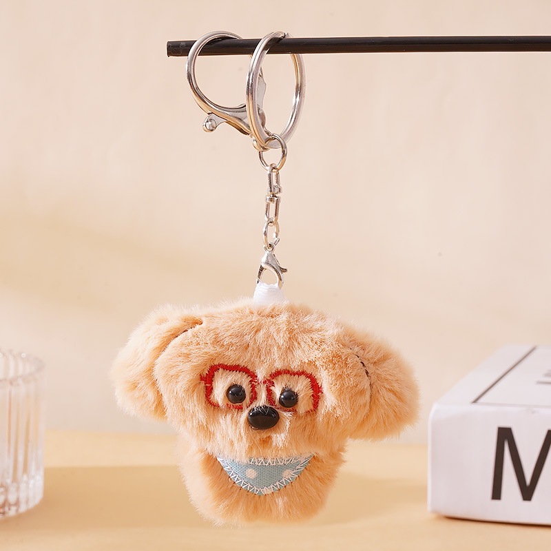 Bib, brown glasses, keychain