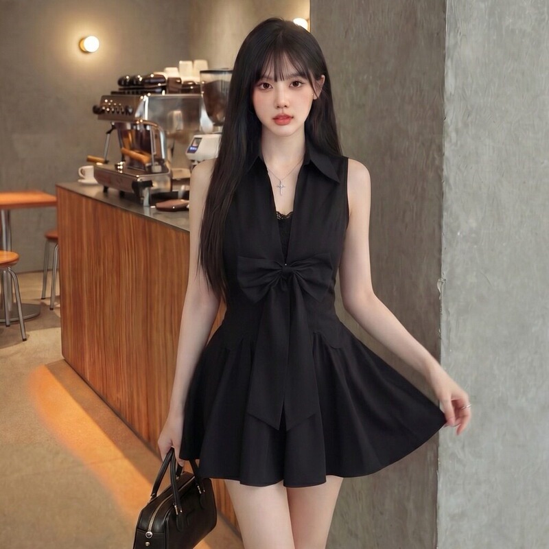 Elegant and stylish black polo shirt sleeveless dress in Audrey Hepburn style, with a flattering waist and an A-line puffy short skirt