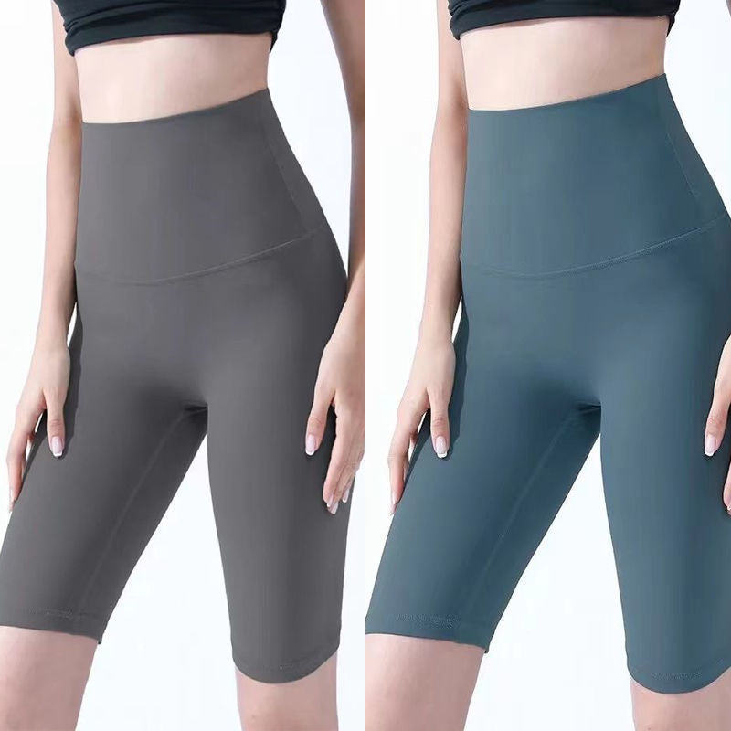 Pantalones cortos desnudos de mujer elásticos apretados para elevar las caderas de cinco puntos pantalones deportivos de secado rápido succión de sudor entrenamiento para correr fábrica de comercio de ping