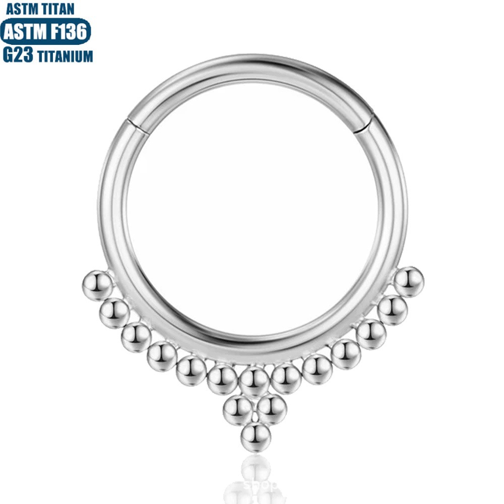 Silver pointed spike labret stud material detail