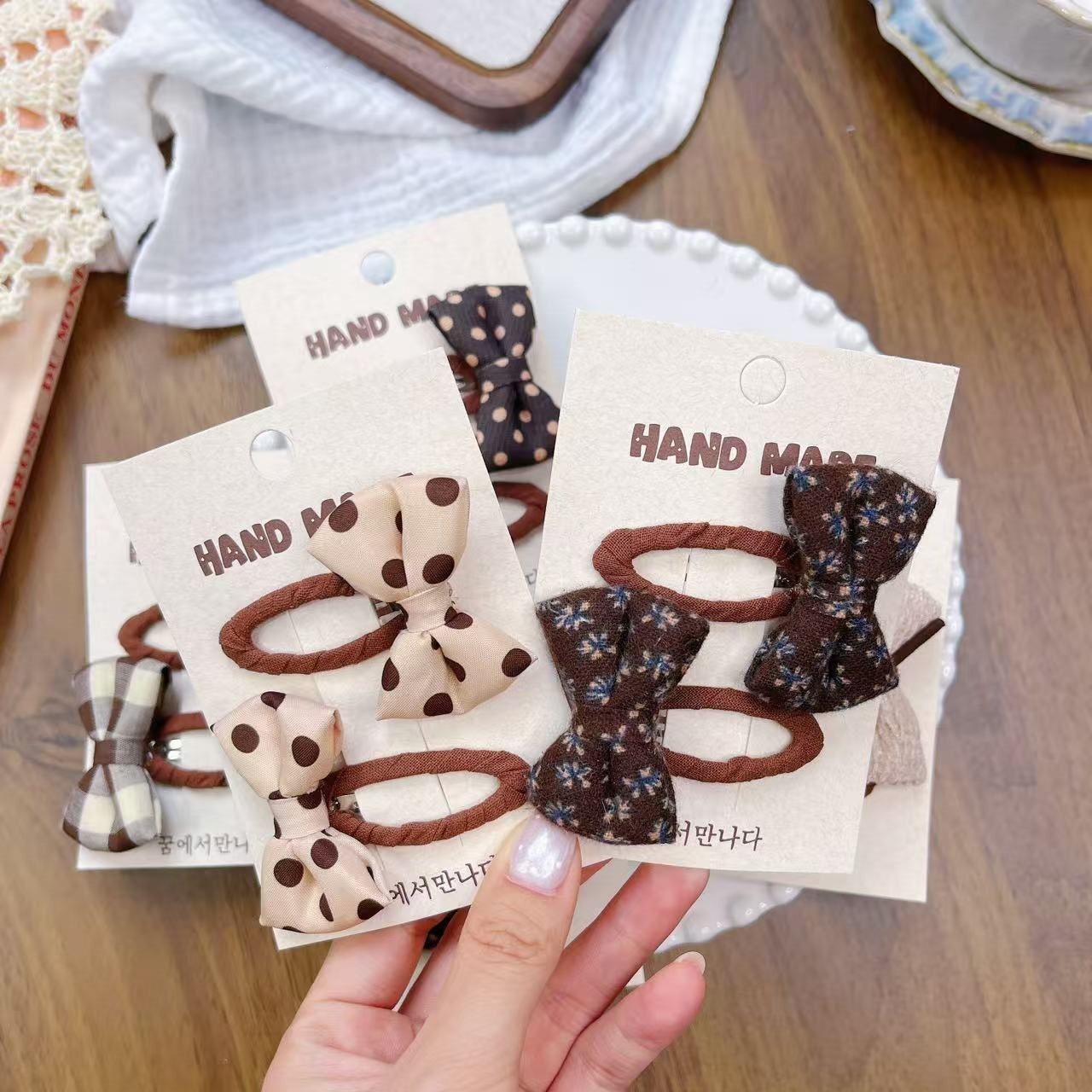 Tejido coreano arco de algodón para niños adornamientos de cabello de color arroz curry anillo de cabello dulce punto de ondulación flor triturada correa de cabello de niñas