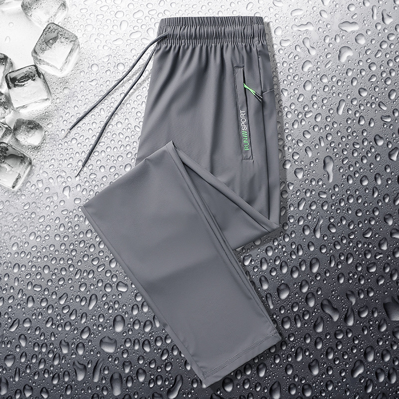Pantalones deportivos casuales de seda de hielo para hombres pantalones de verano finos de punto de oro elásticos de secado rápido casuales atados al tobillo más pantalones de tamaño