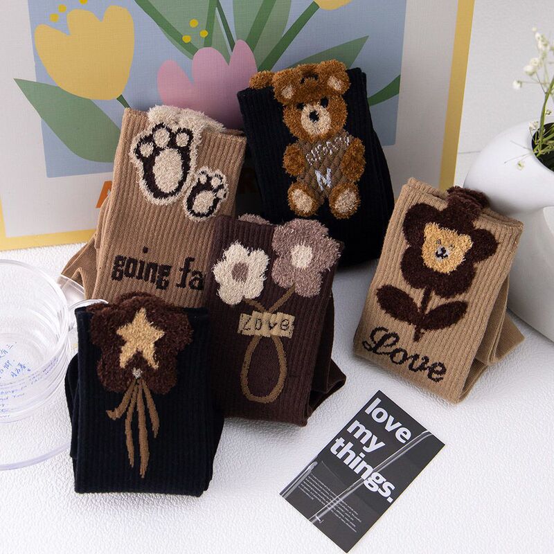 Explosions feather yarn socks children autumn and winter plush small flower pile women's socks high tube bear three-dimensional tube socks wholesale Explosions feather yarn socks children autumn and winter plush small flower pile women's socks high tube bear three-dimensional tube socks wholesale