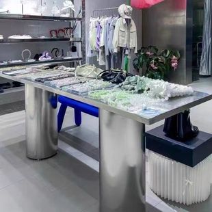 Clothing Store Display Props and Jewelry Display Table with Flowing Water Table in the Middle, Stainless Steel Brushed Island Display Table