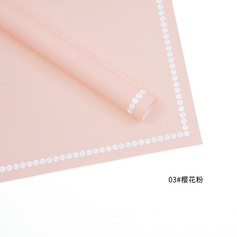 Huaxi fábrica de perlas de palma al por mayor de papel elegante puntos alrededor del borde impermeable perla envoltura material de embalaje de flores de papel