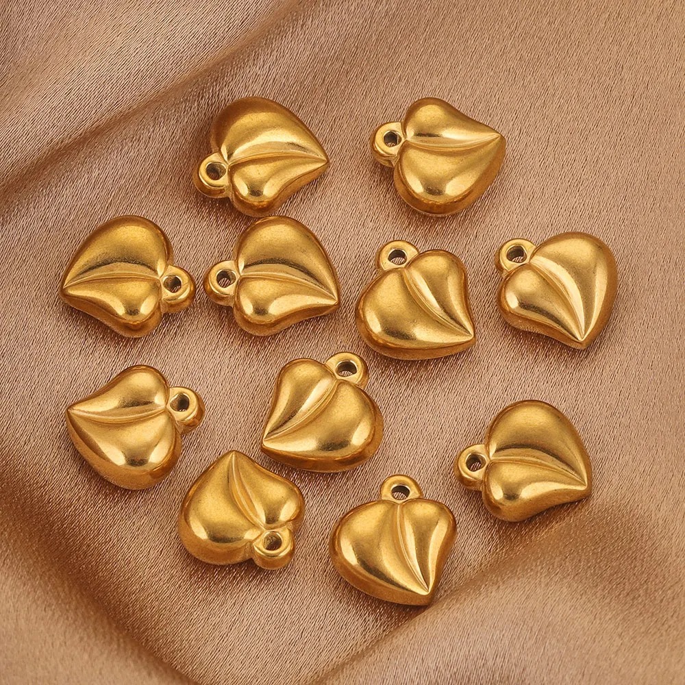 Colgante de corazón de acero inoxidable colgante de torsión sólido acero de titanio vacío accesorios de joyería de oro DIY corazón