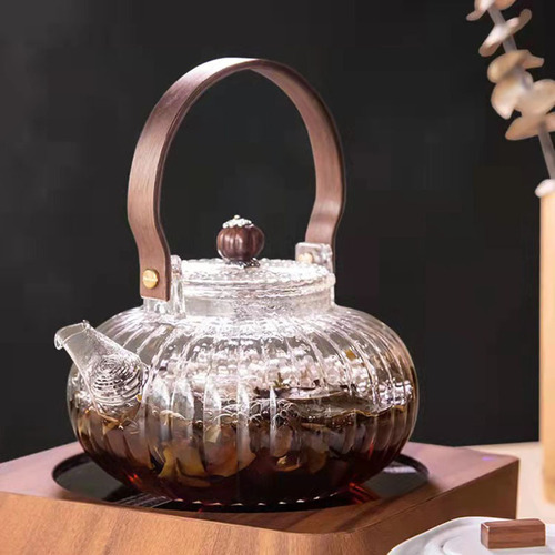 Heat-resistant glass teapot, wood-fired tea brewing with a thickened glass bubble tea pot, home use high borosilicate glass tea pot with a wooden handle