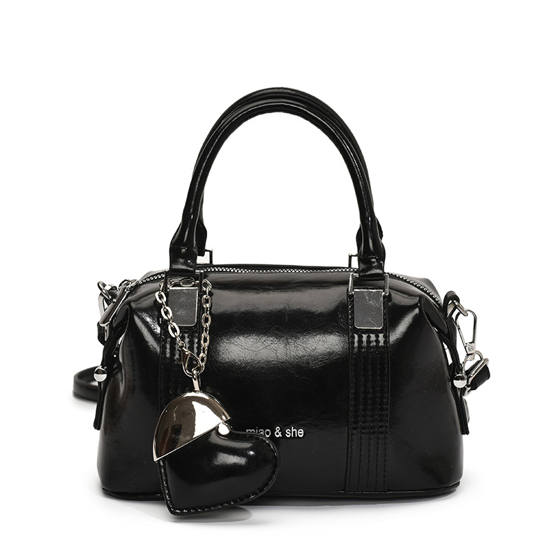 Transfronterizo de alto nivel sensación de viaje bolso de mano para mujeres 2025 nuevo estilo de moda universal bolso de hombro simple mochila casual