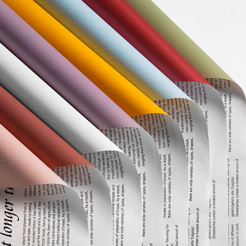 厂家批发白雪公主英文报纸鲜花包装纸白色英文字母欧雅纸包花纸