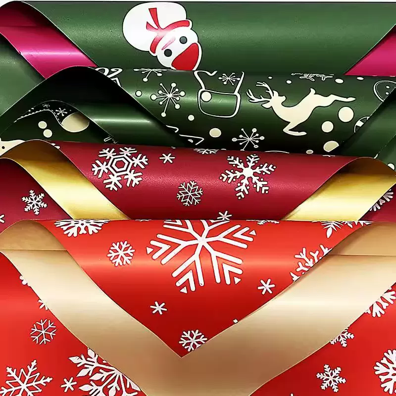 圣诞节礼品包装纸平安夜包苹果欧雅防水鲜花包花材料花束花艺diy