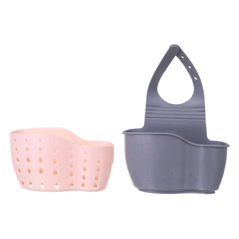 Necesidades diarias cocina drenaje cesta colgante bolsa colgante hueco para lavar platos cesta de almacenamiento de esponja cesta de almacenamiento de plástico al por mayor