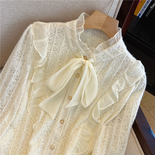 French-style designer solid-color bow shirt for women—winter base layer, chic little top with flowing ribbons and lace-matching long-sleeved blouse.