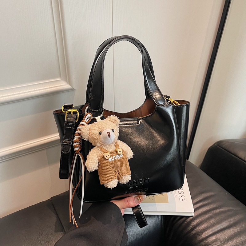 Vintage Maillard bolso de mano para mujeres 2025 nuevo estilo transfronterizo popular aceite cera cuero bolso de cubo textura mochila