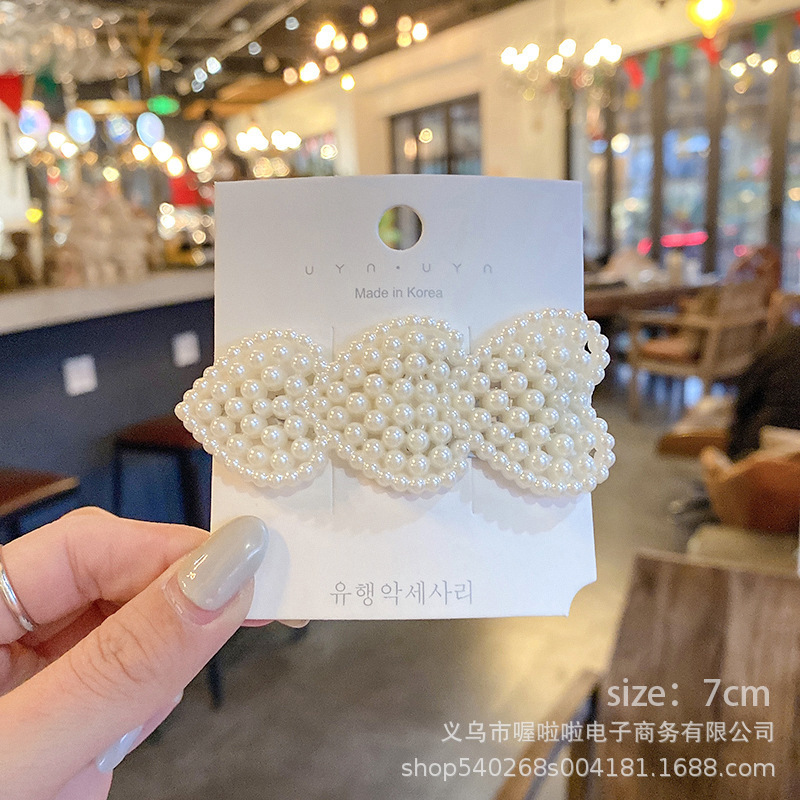 Pasador de pelo de perlas de alta gama estilo francés para mujer, clip para flequillo lateral, elegante clip para el pelo de la frente, accesorio para el pelo tipo pico de pato.