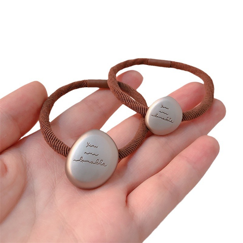 Estrellas metálicas irregulares anillo de cabello temperamento joven de alta elástica cola de caballo cuerda simple banda de goma adornos de cabello