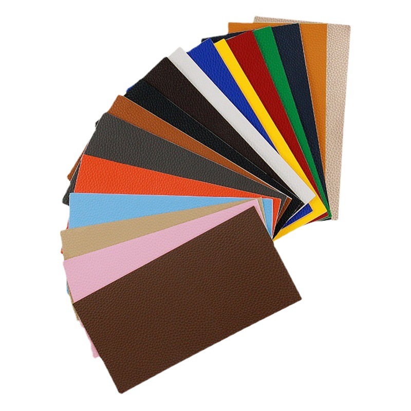 Los fabricantes suministran el subsidio de reparación de cuero de color autoadhesivo completo PU Litchi grano Road pegatinas sofá cojín agujero parche pegatinas