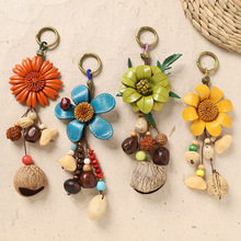 原创手工牛皮花朵果壳包挂森系复古摇铃音疗挂铃植物果实背包挂件