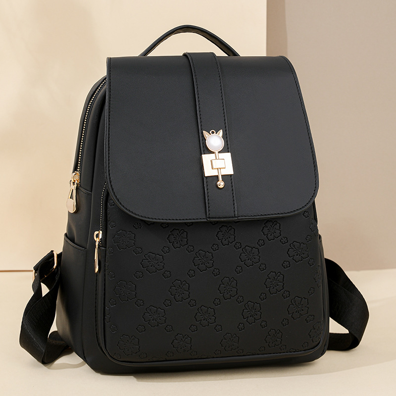 Mochila de cuero suave para mujer 2025 nuevo estilo en relieve todo fósforo de gran capacidad para mujer mochila pequeña bolsa de viaje al aire libre al por mayor