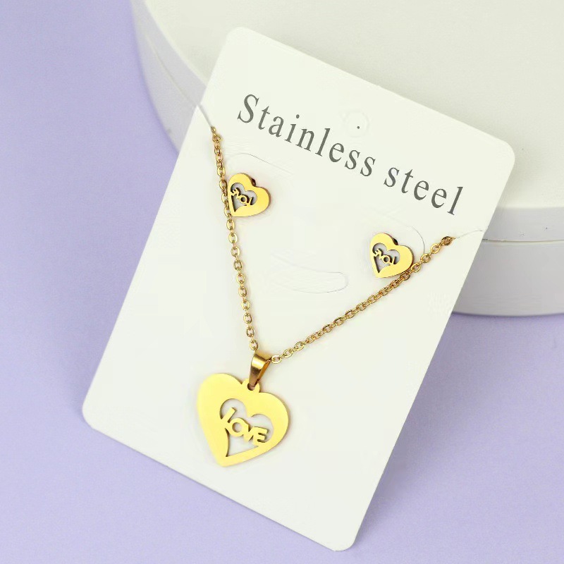 Net Red Butterfly Love Cross Personalidad Simple Juego de joyas de acero inoxidable Pendientes de oro Juego de collar al por mayor