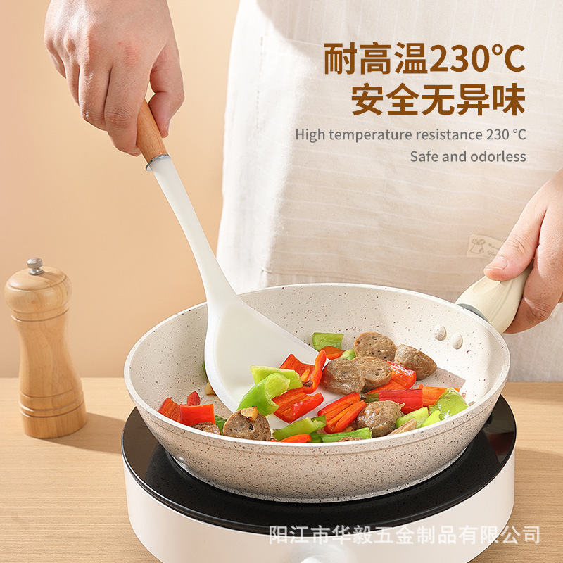 Creativo nuevo estilo, utensilios de cocina de silicona translúcida, juego de pala de sartén antiadherente, pala de silicona de grado alimenticio, mango de haya en stock