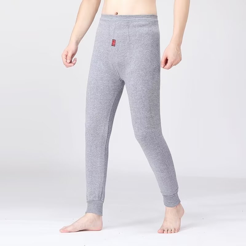 Deportes de invierno para hombres, pantalones de nueve puntos con pies de guardia más leggings de moda juvenil microelástico con patas de terciopelo
