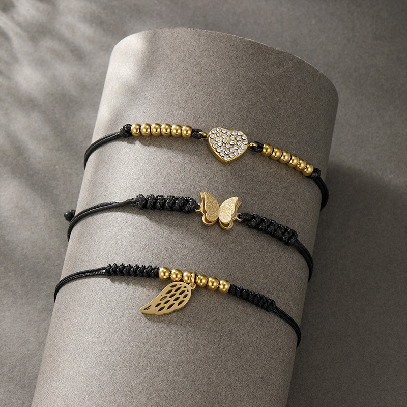 Nueva pulsera de la serie Black Rope de Xuping, chapada en oro de 14k, para hombre y mujer, con un diseño minimalista único.