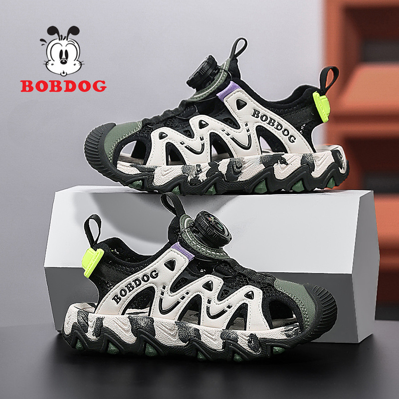 Sandalias Babudou para niño verano nuevo estilo antideslizante botón de suela suave sandalias Baotou zapatos de playa princesa para niñas grandes y medianas
