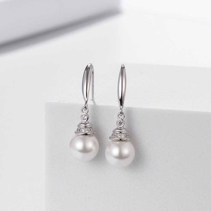 Estilo coreano Internet celebridad estilo perla pendientes S925 plata esterlina simple diamante fresco-incrustado abalorios pendientes para las mujeres al por mayor