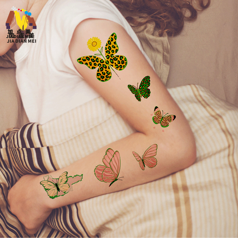 Venta caliente en el extranjero sudor impermeable luminoso dibujos animados lindo mariposa tatuaje pegatinas de larga duración protección ambiental luminosa tatuaje de los niños